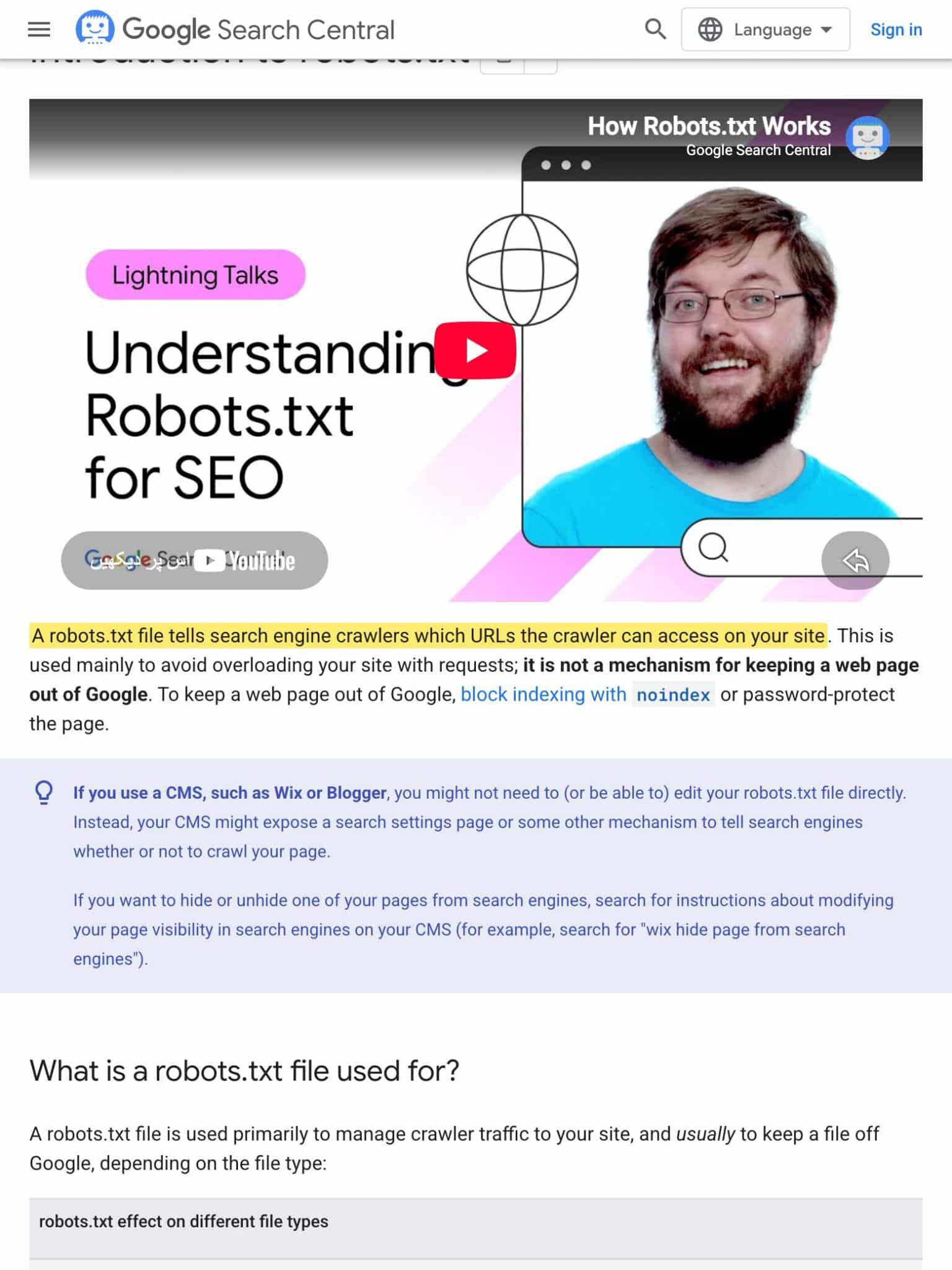 Google Search Central Introduction to robots.txt page with the sentence highlighted in yellow: a robots.txt file tells search engine crawlers which URLs the crawler can access on your site